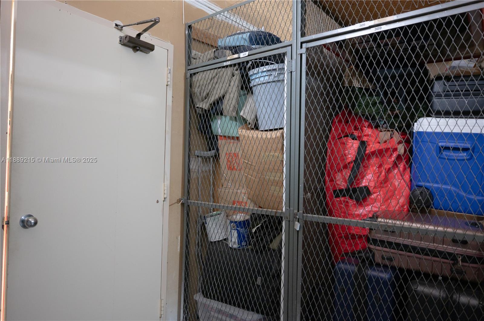 3 Grove Isle Drive, Unit C308 Miami, FL 33133 - Photo 30 of 54 a view of walk in closet