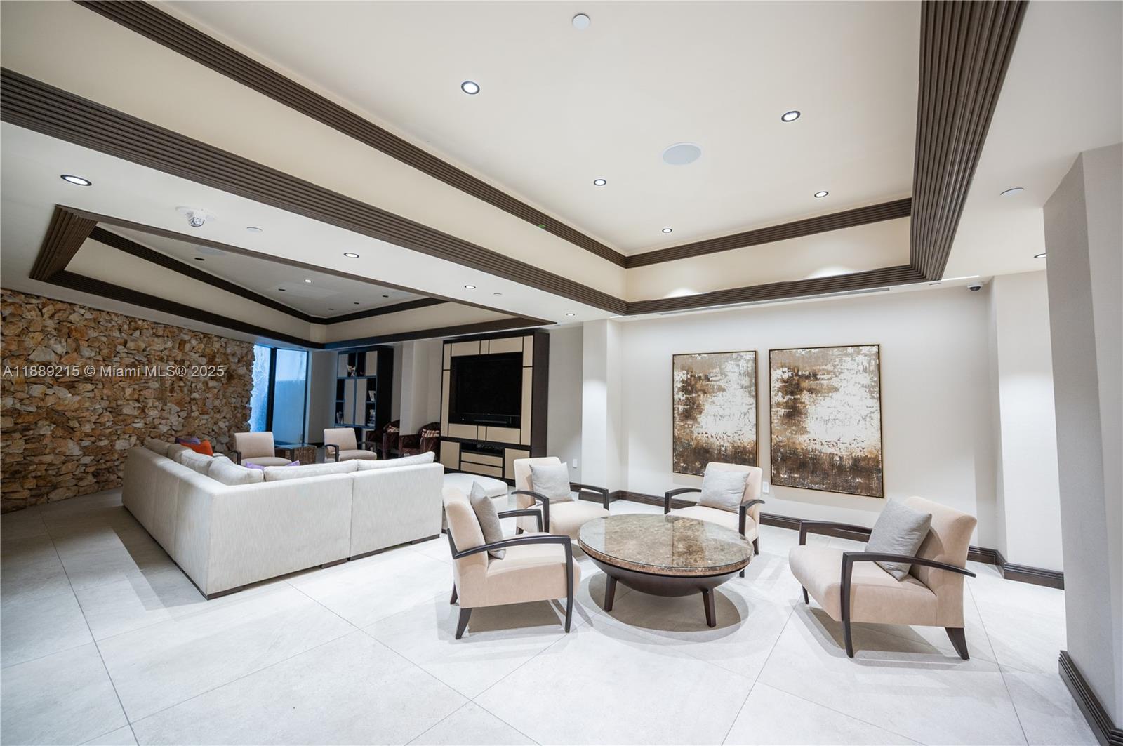 3 Grove Isle Drive, Unit C308 Miami, FL 33133 - Photo 46 of 54 a living room with fireplace furniture and a large window