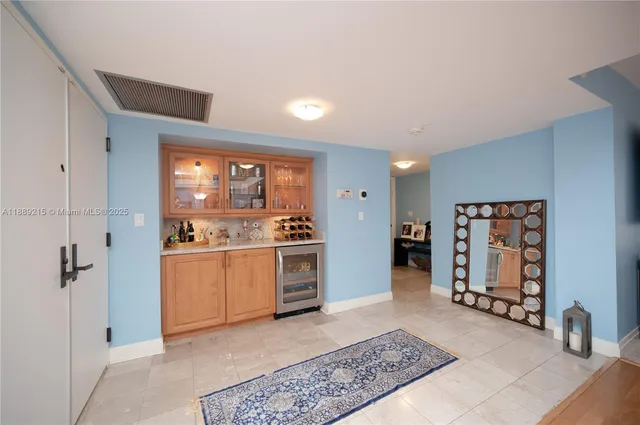 a bathroom with a sink a vanity and a mirror