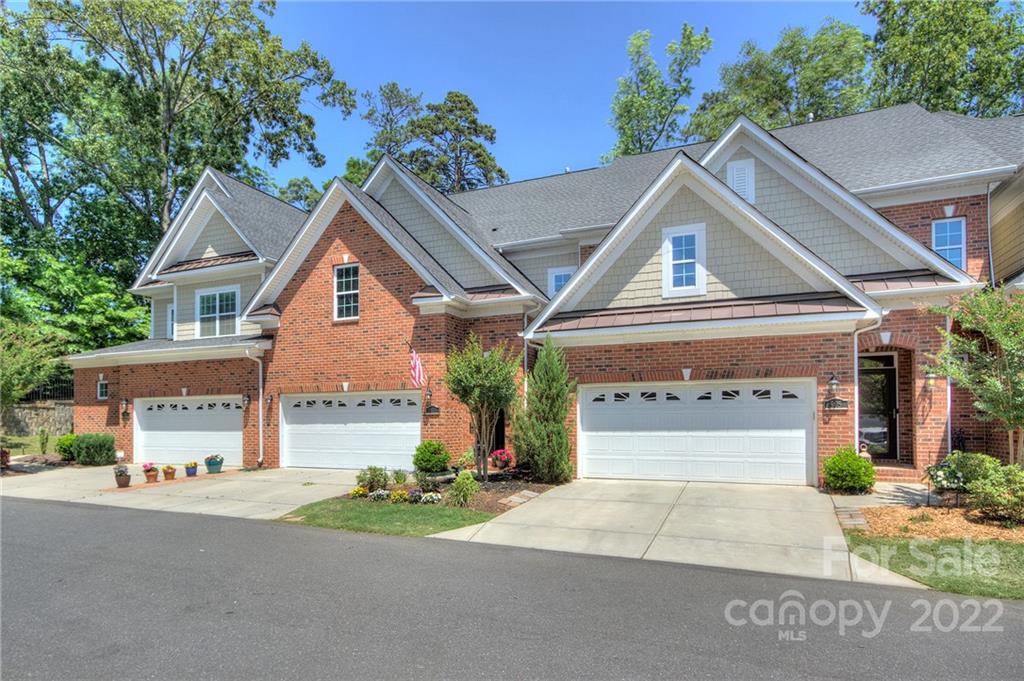 905 Ospre Lane Fort Mill, SC 29708 - Photo 35 of 35 a front view of a house with a yard and garage