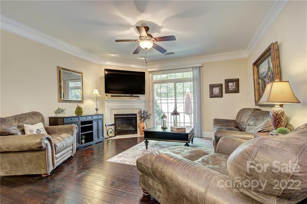 905 Ospre Lane Fort Mill, SC 29708 - Photo 10 of 35 a living room with furniture flat screen tv and wooden floor