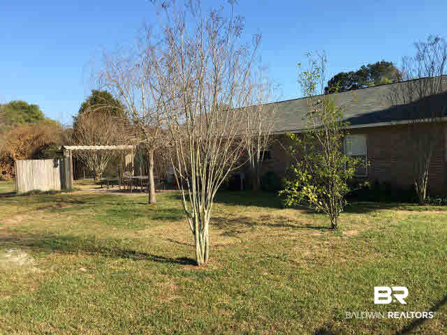 14977 Highland Circle Foley, AL 36535 - Photo 9 of 12 backyard