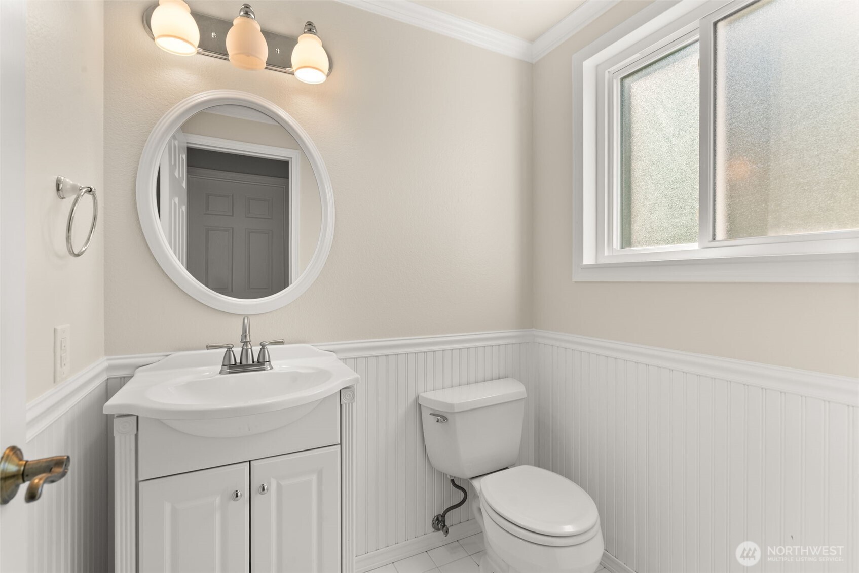 13603 Southeast 239th Street Kent, WA 98042 - Photo 8 of 23 a bathroom with a sink a toilet and a mirror