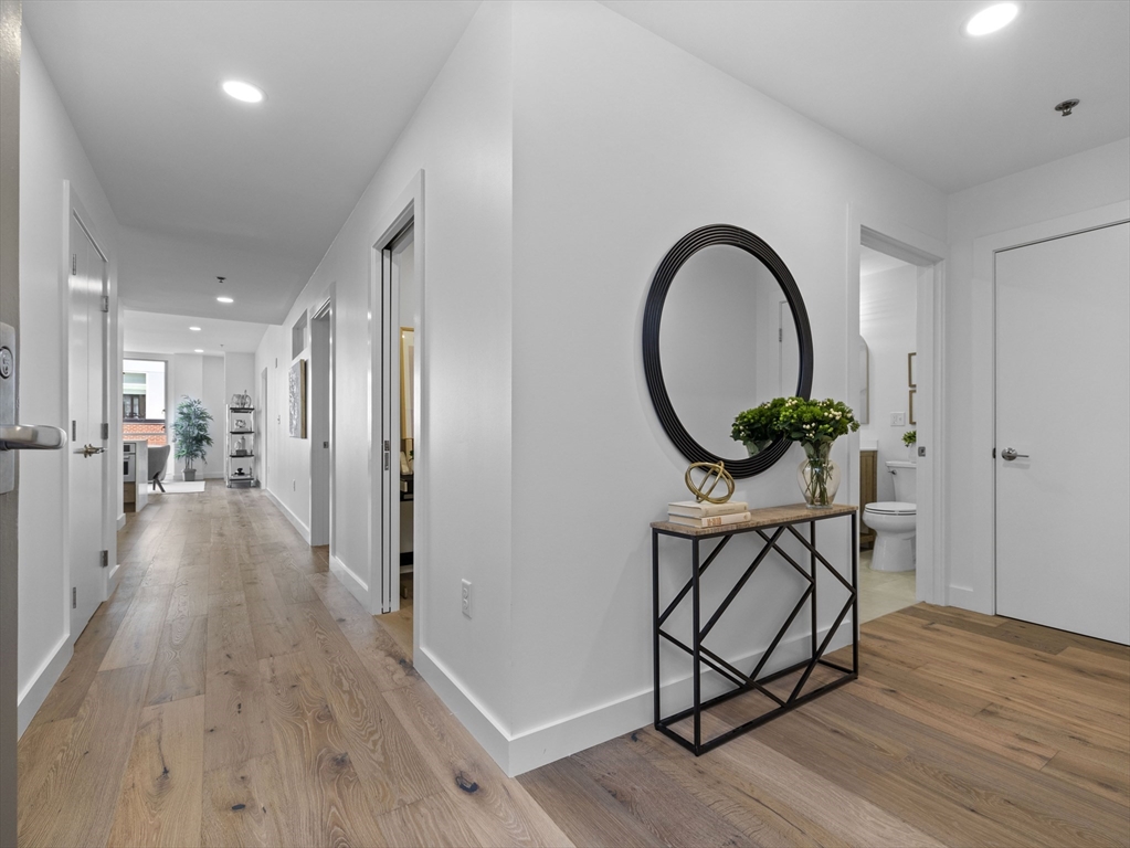 234 Causeway Street, Unit 906 Boston, MA 02114 - Photo 20 of 20 a view of a livingroom with furniture and hardwood floor