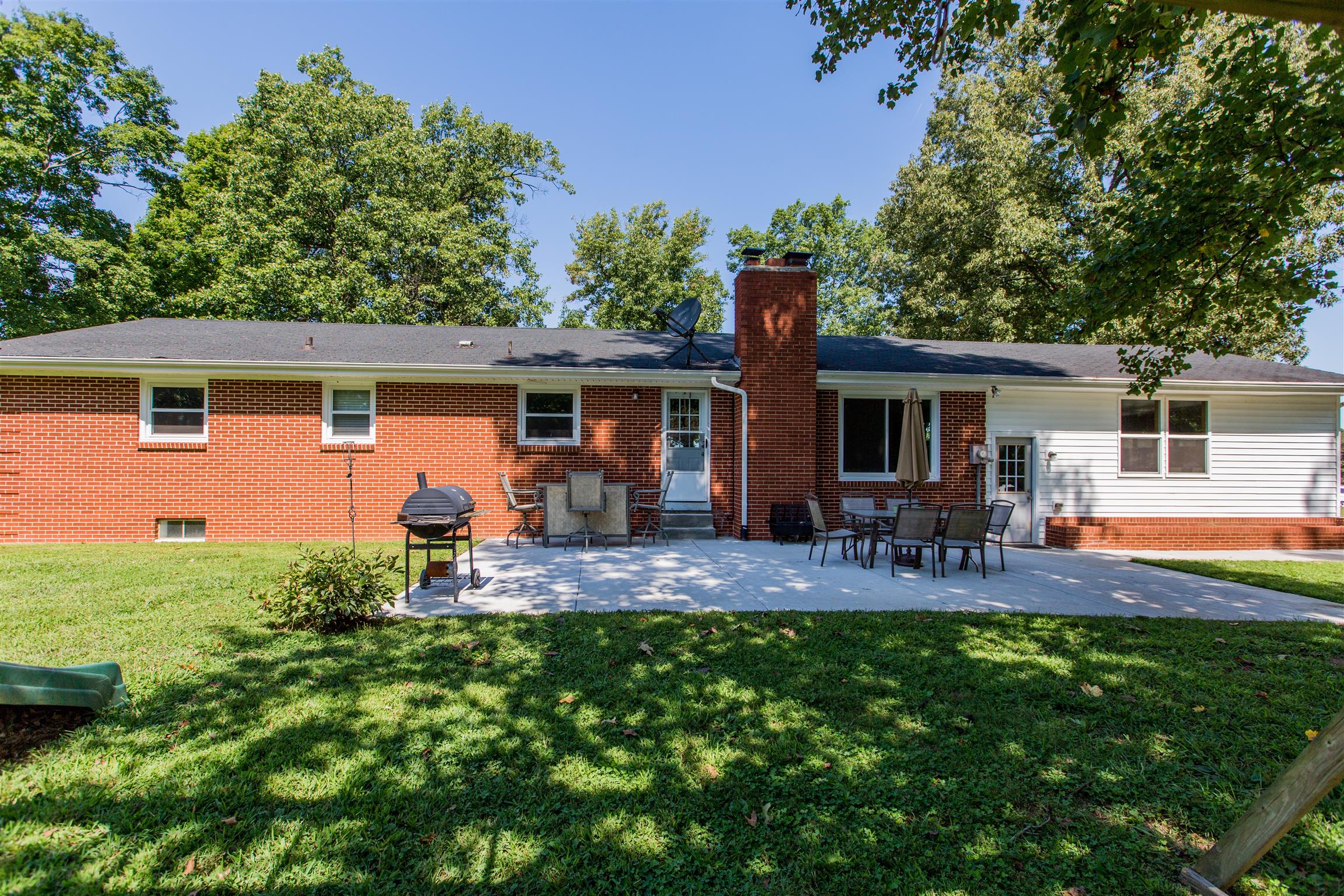 4671 Benson Road Springfield, TN 37172 - Photo 3 of 27 a view of a house with backyard and sitting area