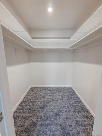 a view of a room with an empty space