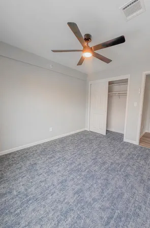 a view of a ceiling fan in a room