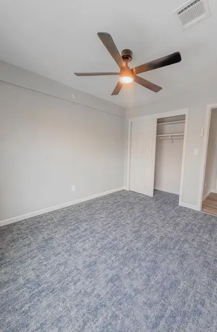 a view of a ceiling fan in a room