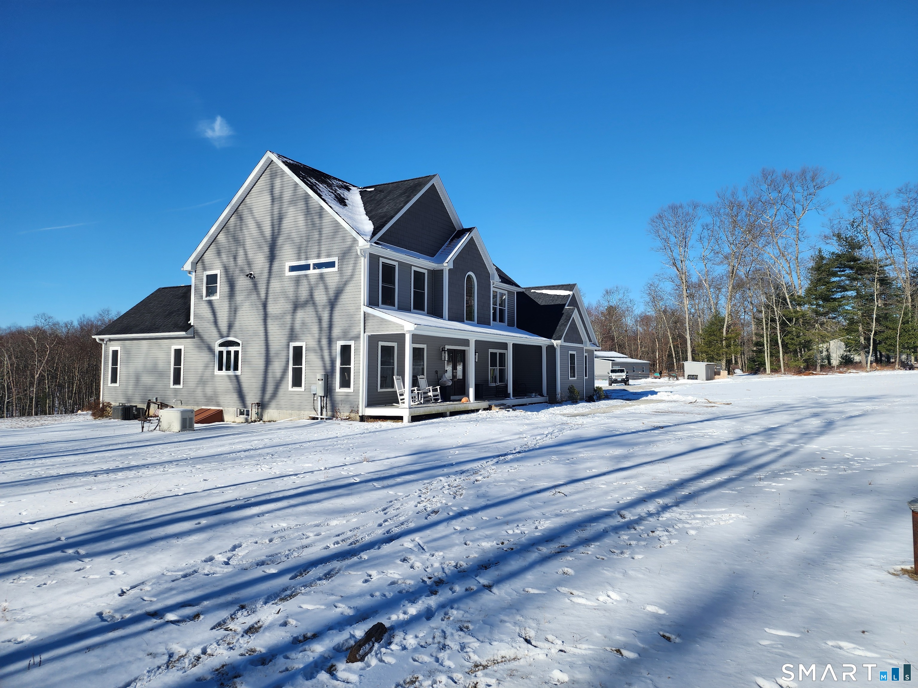 95 Old Breakneck Road Killingly, CT 06241 - Photo 2 of 39 a view of a house next to a road