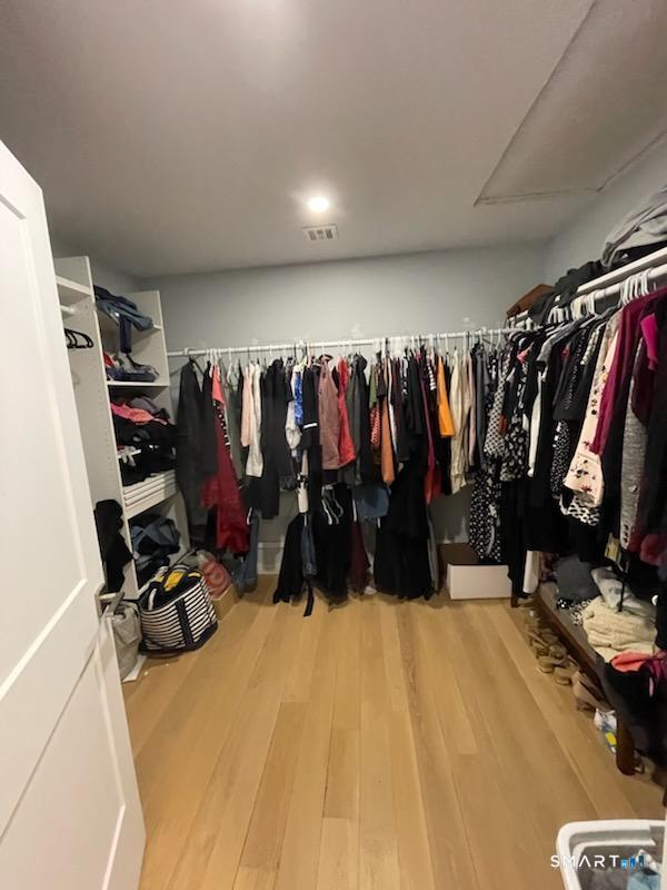 95 Old Breakneck Road Killingly, CT 06241 - Photo 23 of 39 a view of walk in closet with clothes and shoes