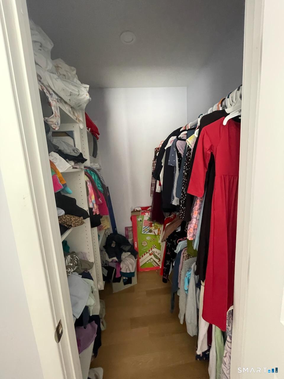 95 Old Breakneck Road Killingly, CT 06241 - Photo 25 of 39 a view of walk in closet with clothes and shoes