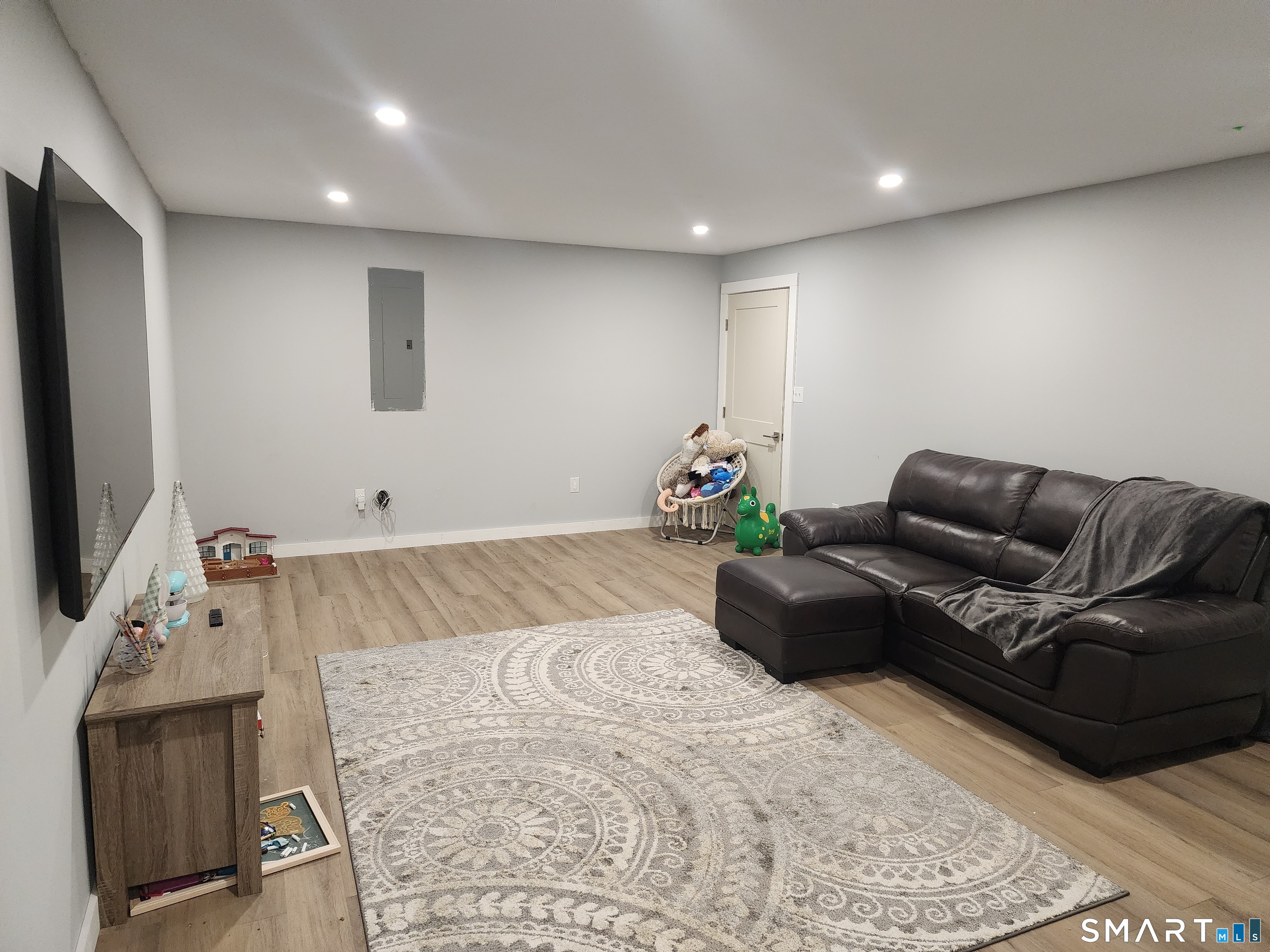 95 Old Breakneck Road Killingly, CT 06241 - Photo 28 of 39 a living room with furniture and a flat screen tv