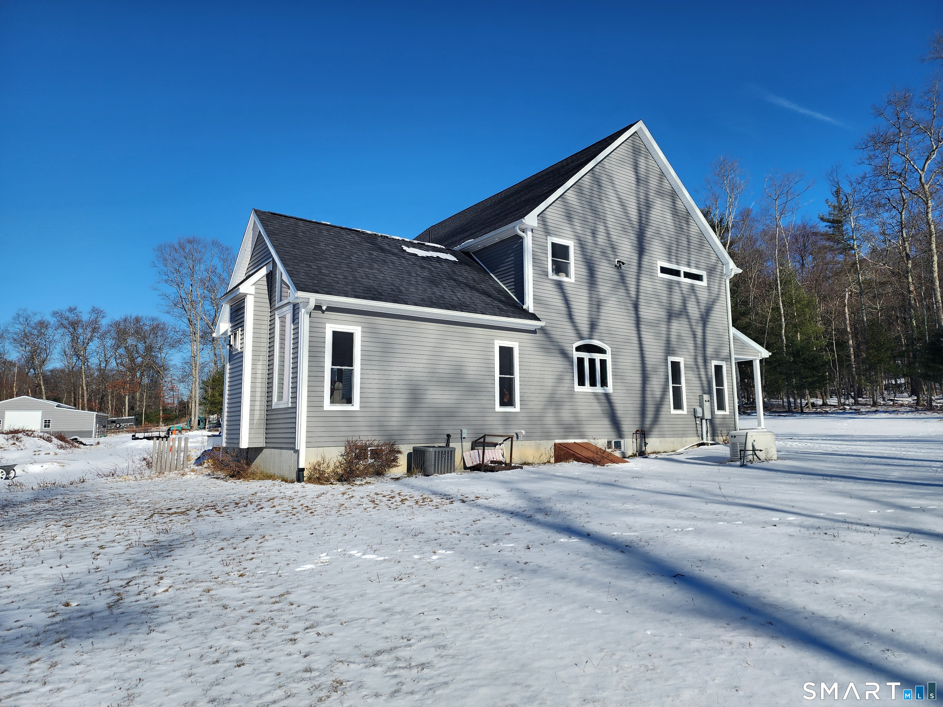 95 Old Breakneck Road Killingly, CT 06241 - Photo 3 of 39 a view of a house with large windows