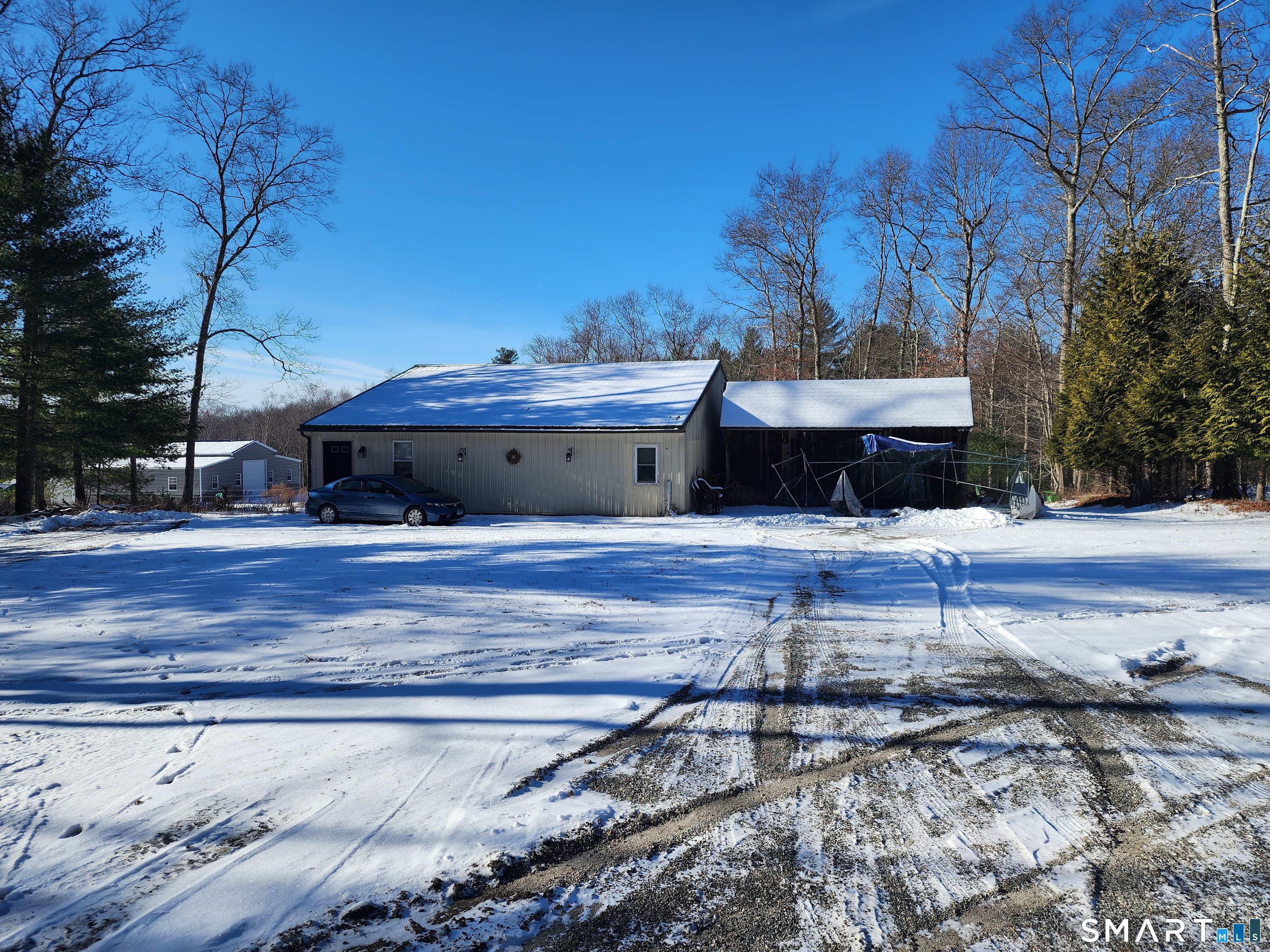 95 Old Breakneck Road Killingly, CT 06241 - Photo 31 of 39 a view of a house with a yard