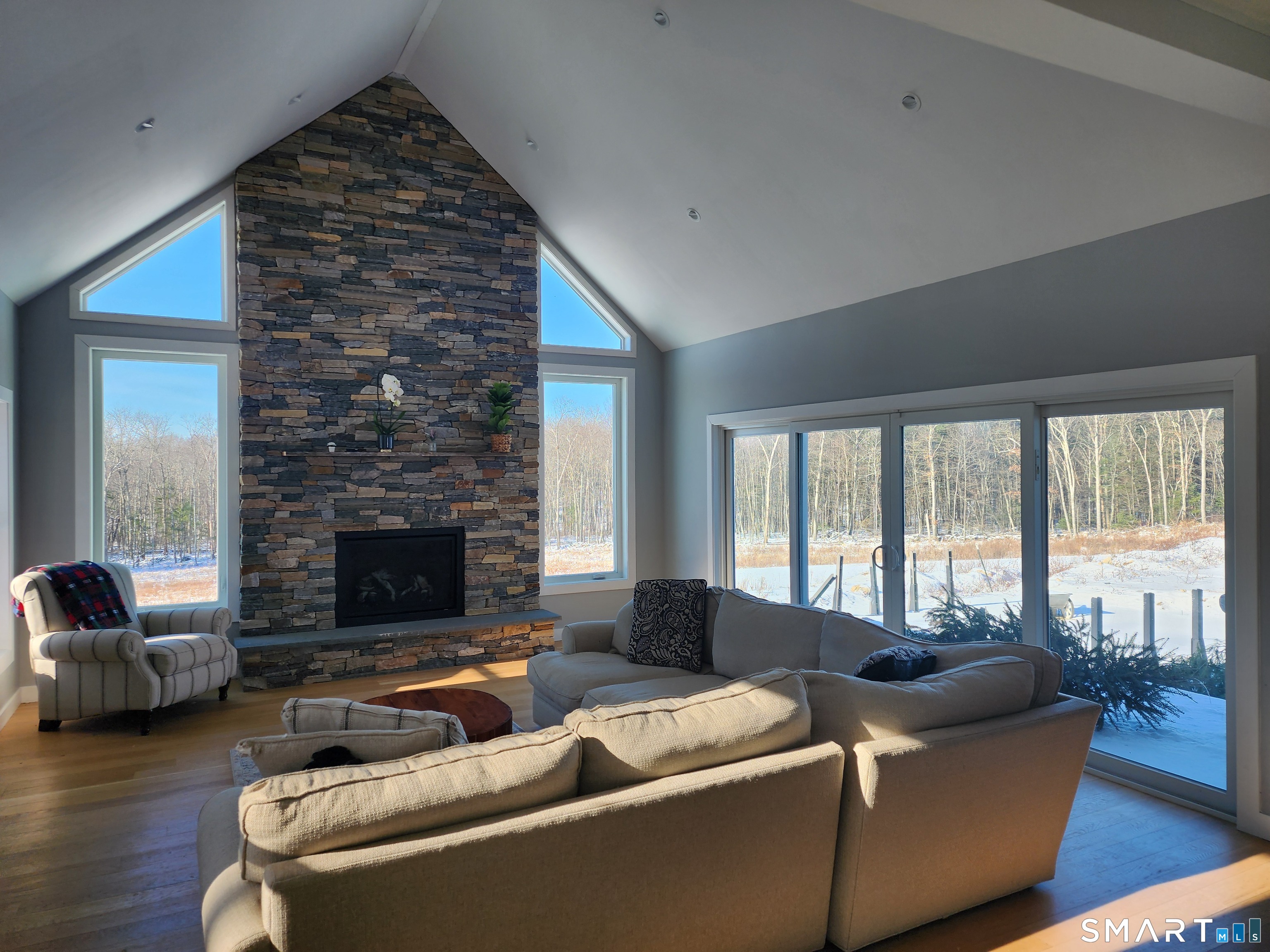95 Old Breakneck Road Killingly, CT 06241 - Photo 8 of 39 a living room with furniture and a fireplace