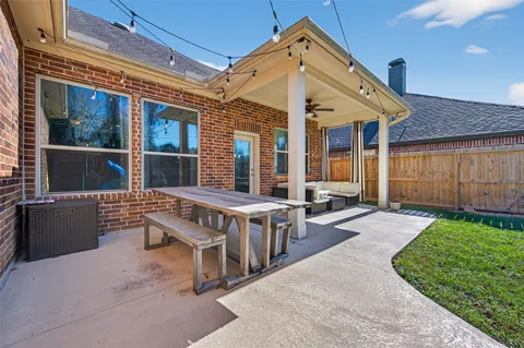 front view of a house with a patio