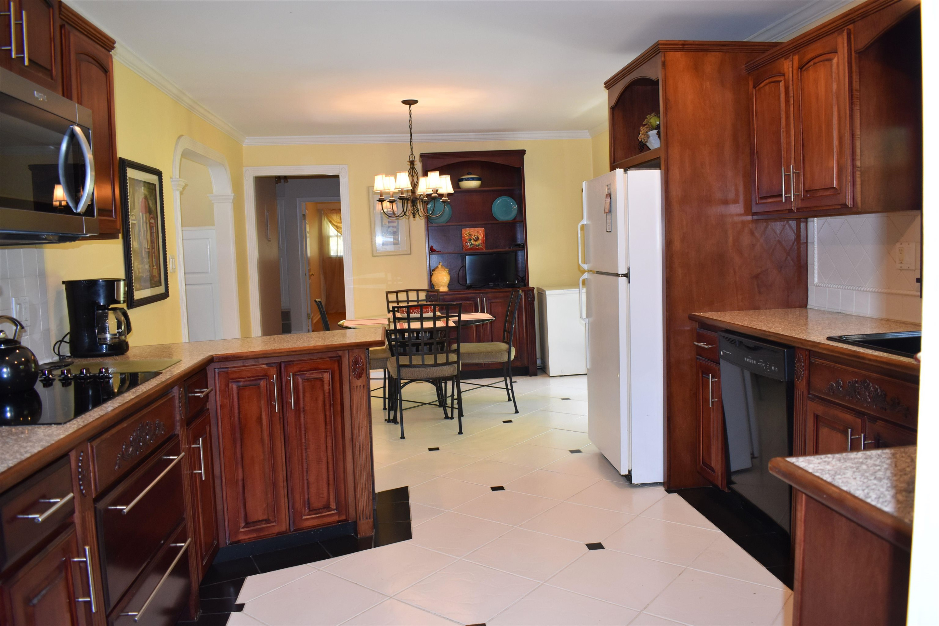 512 Grovemont Road Raleigh, NC 27603 - Photo 10 of 23 View from kitchen through breakfast room! Kitchen