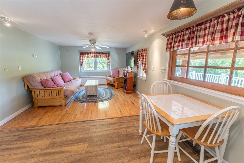 9 Chandler Road Holland, MA 01521 - Photo 15 of 42 a living room with furniture a window and a table