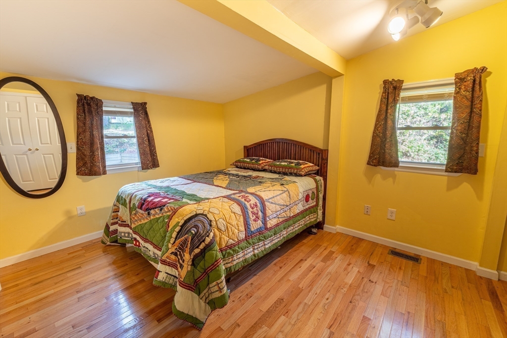 9 Chandler Road Holland, MA 01521 - Photo 17 of 42 a bedroom with a bed and a window