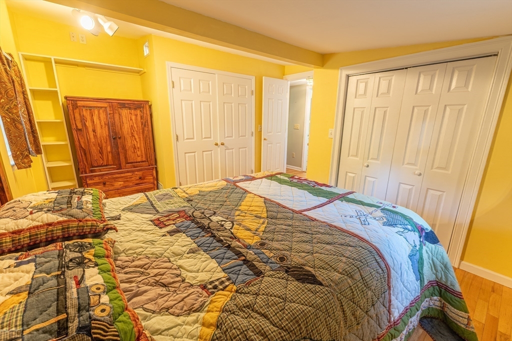 9 Chandler Road Holland, MA 01521 - Photo 19 of 42 a bedroom with a bed and a window