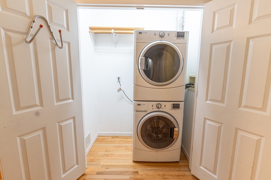 9 Chandler Road Holland, MA 01521 - Photo 20 of 42 a view of a hallway with washer and dryer