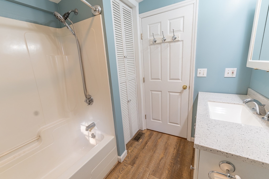 9 Chandler Road Holland, MA 01521 - Photo 23 of 42 a bathroom with a sink and a tub