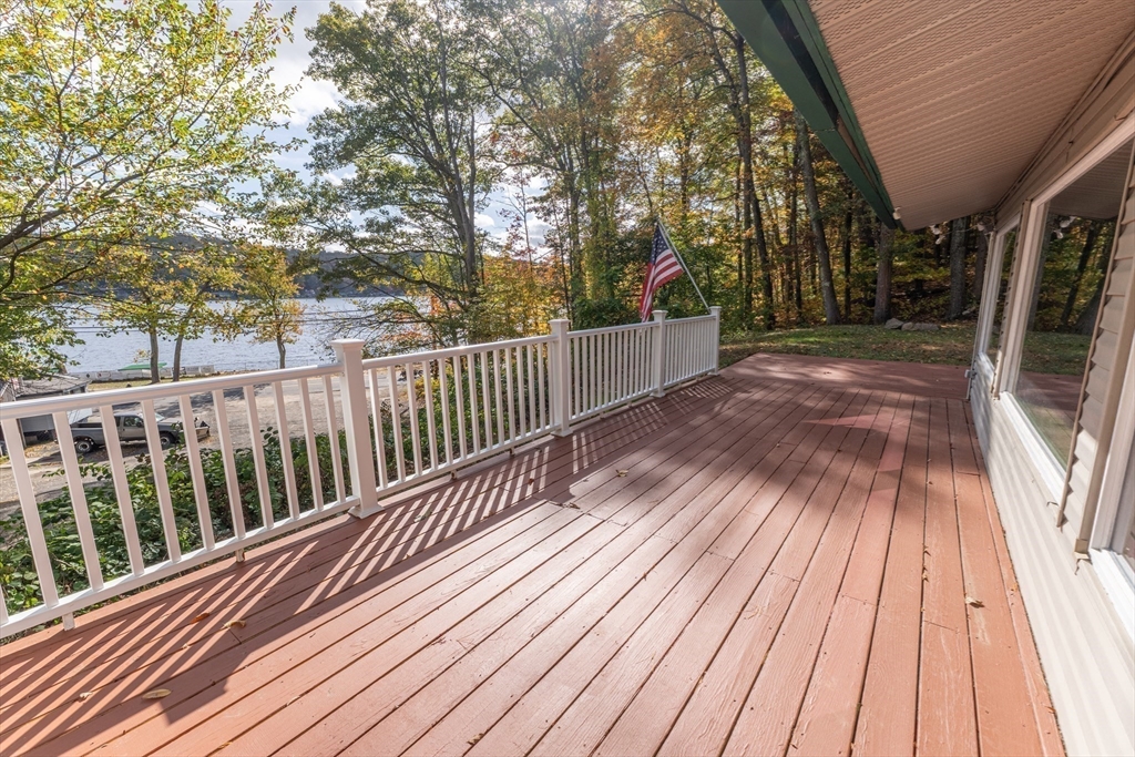 9 Chandler Road Holland, MA 01521 - Photo 24 of 42 a view of backyard with deck and wooden floor