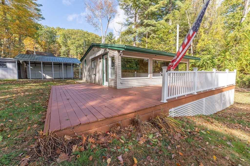 9 Chandler Road Holland, MA 01521 - Photo 28 of 42 a view of a house with a yard