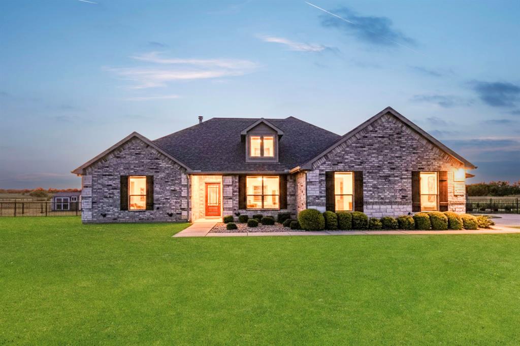 634 Gant Road Sherman, TX 75090 - Photo 2 of 40 Stone and brick exterior with a dark shingle roof