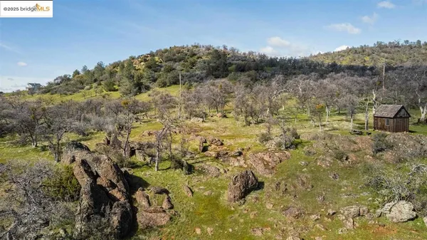 a view of lake with green space