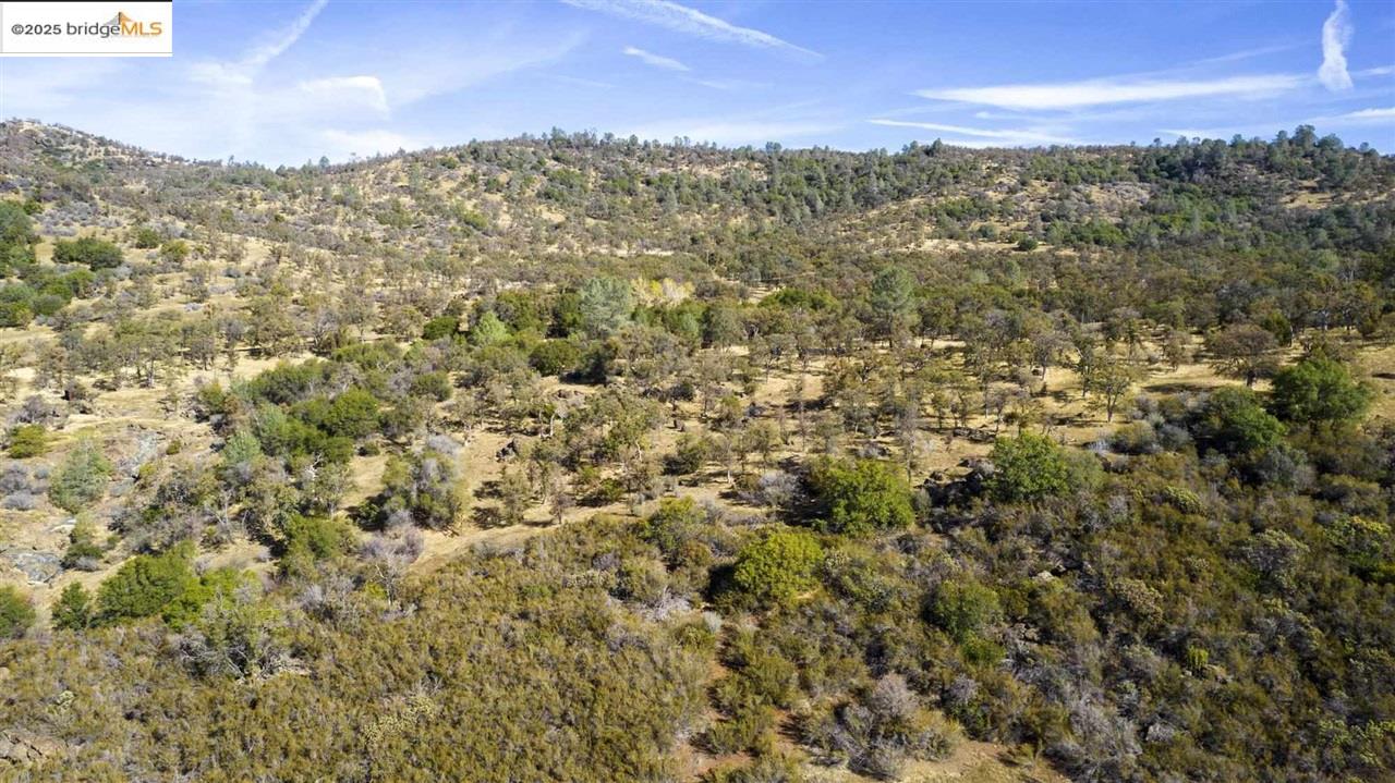 16275 Moccasin Ranch, Unit PARCEL 29 Turlock, CA 95382 - Photo 25 of 27 a view of a city with mountains in the background