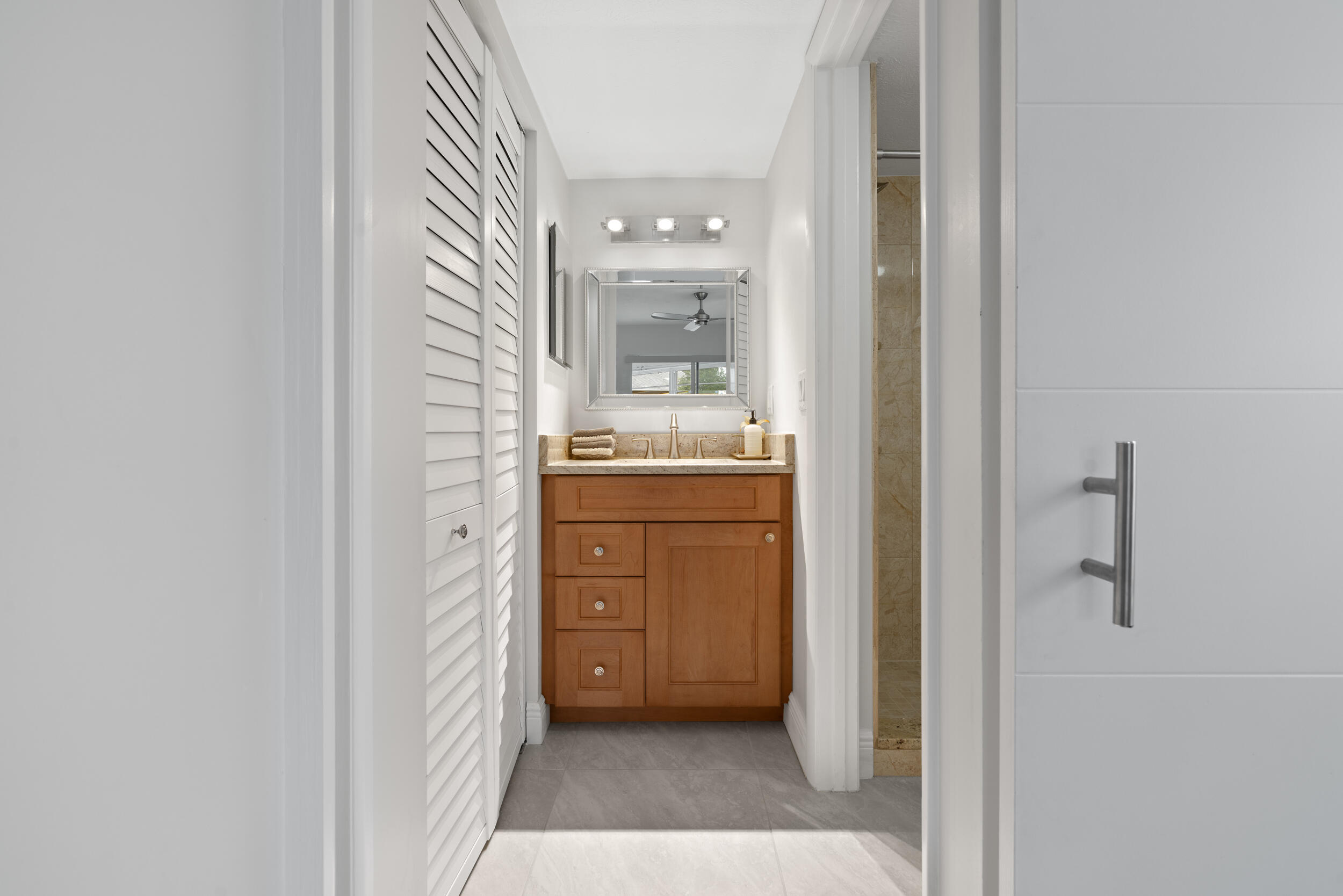 3236 Southeast Aster Lane, Unit M228 Stuart, FL 34994 - Photo 19 of 51 a room with a washer and dryer