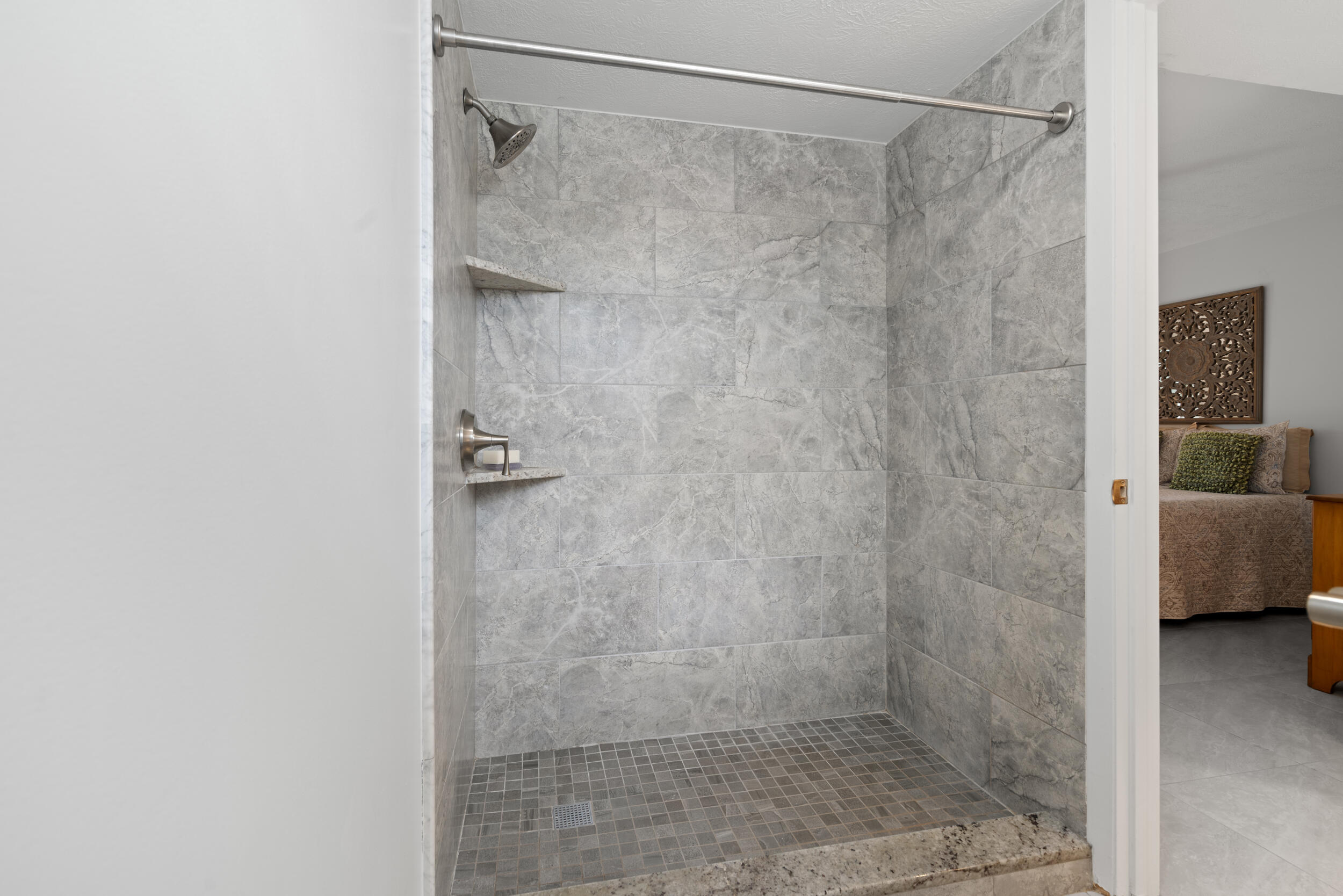 3236 Southeast Aster Lane, Unit M228 Stuart, FL 34994 - Photo 33 of 51 a bathroom with a shower
