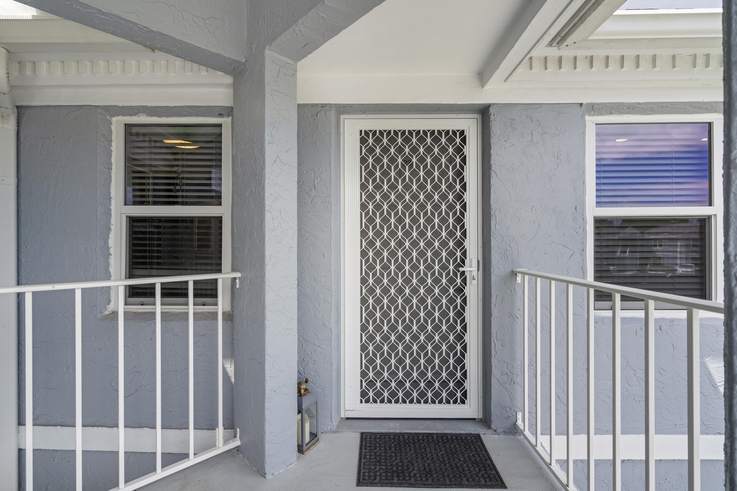 3236 Southeast Aster Lane, Unit M228 Stuart, FL 34994 - Photo 37 of 51 a view of wooden door