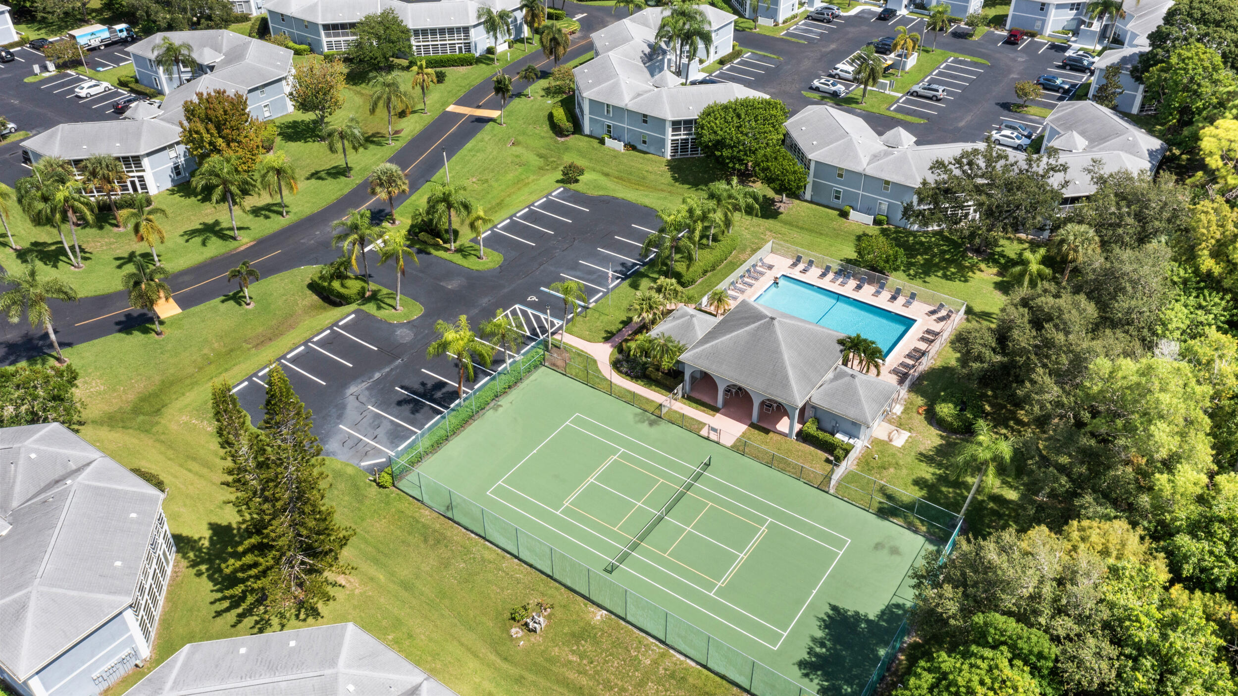 3236 Southeast Aster Lane, Unit M228 Stuart, FL 34994 - Photo 45 of 51 an aerial view of a house