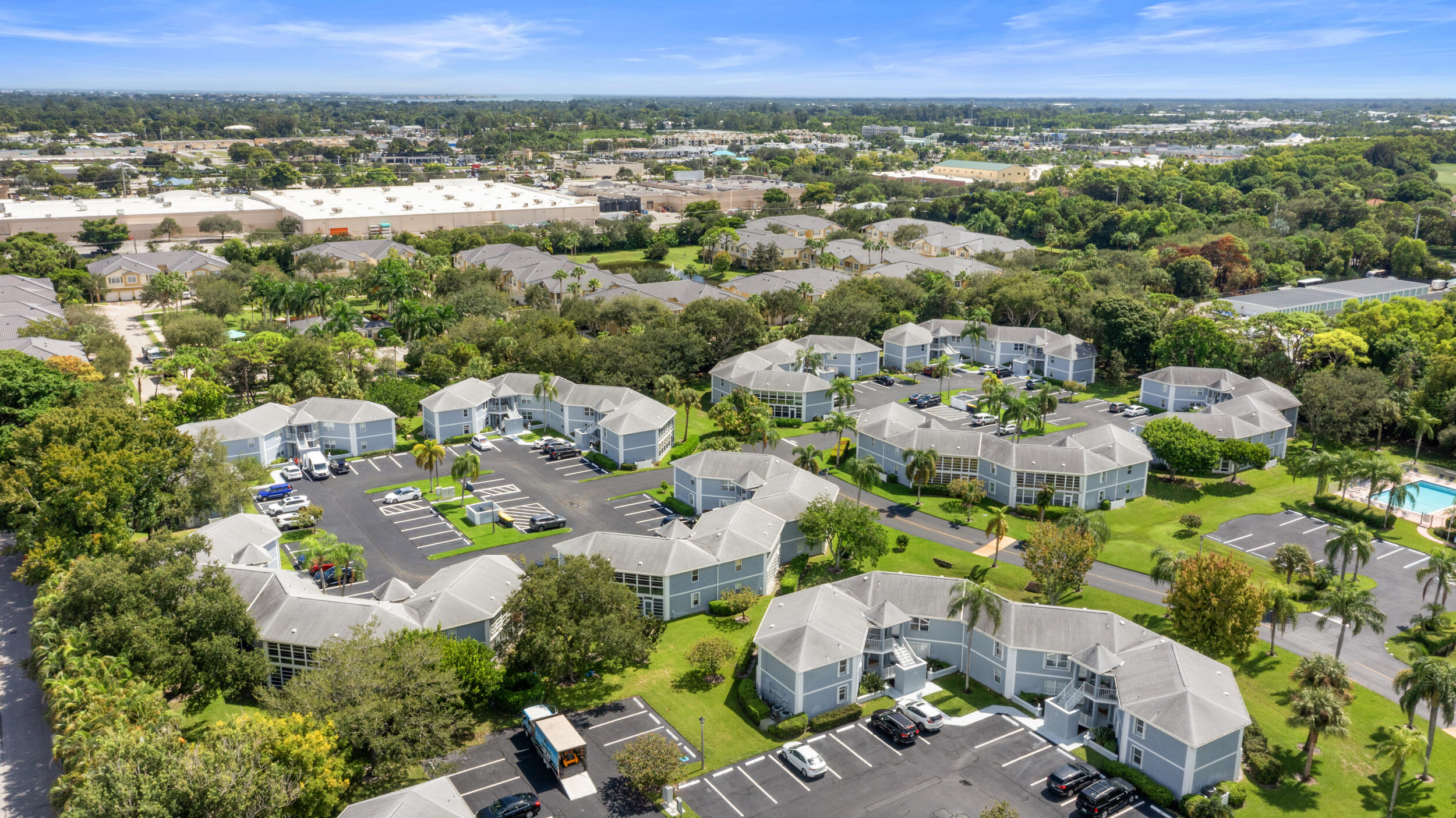 3236 Southeast Aster Lane, Unit M228 Stuart, FL 34994 - Photo 49 of 51 an aerial view of multiple house