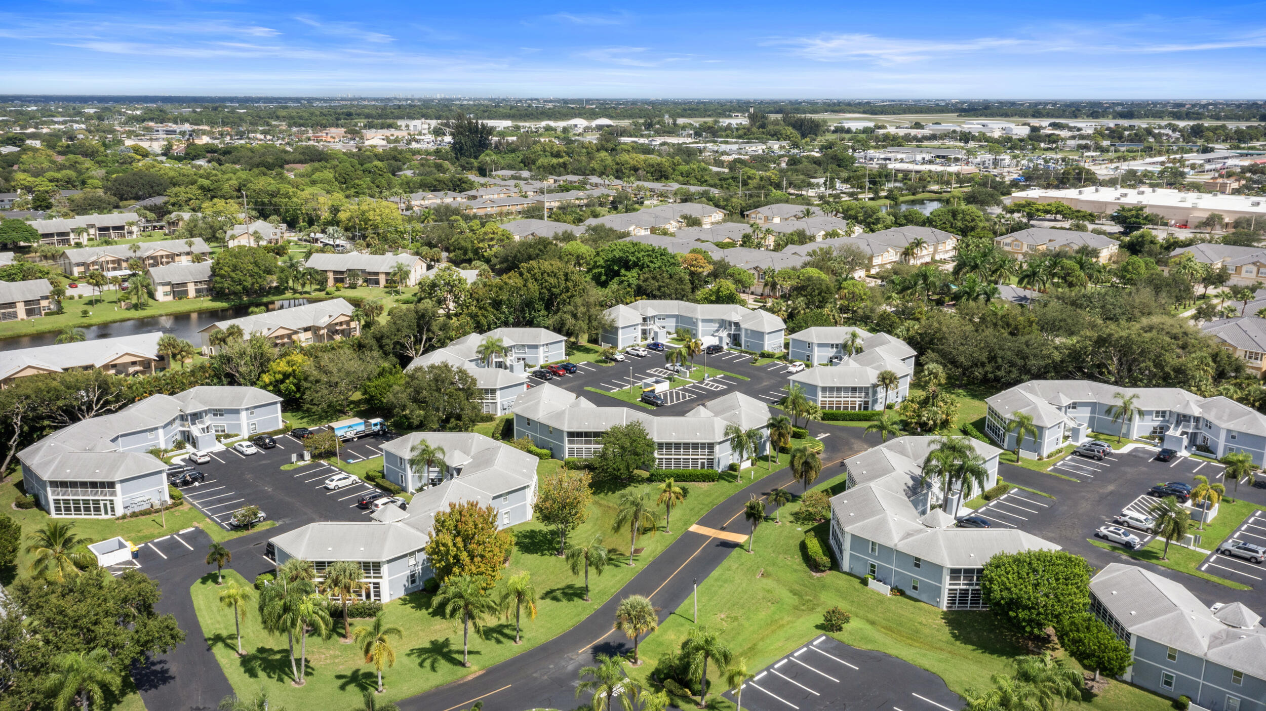 3236 Southeast Aster Lane, Unit M228 Stuart, FL 34994 - Photo 50 of 51 an aerial view of multiple house