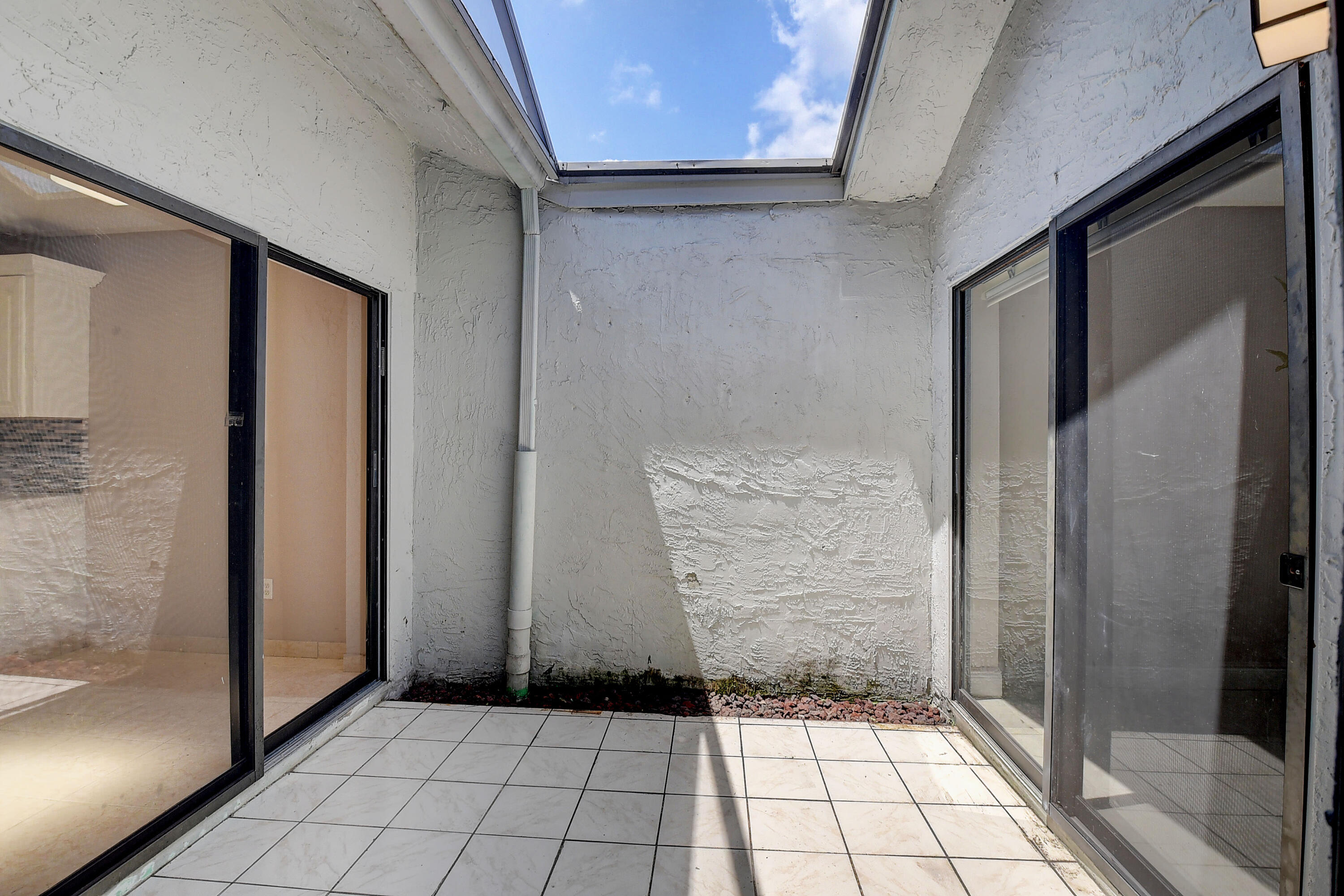 9105 Southwest 22nd Street, Unit E Boca Raton, FL 33428 - Photo 11 of 30 PRIVATE ATRIUM
