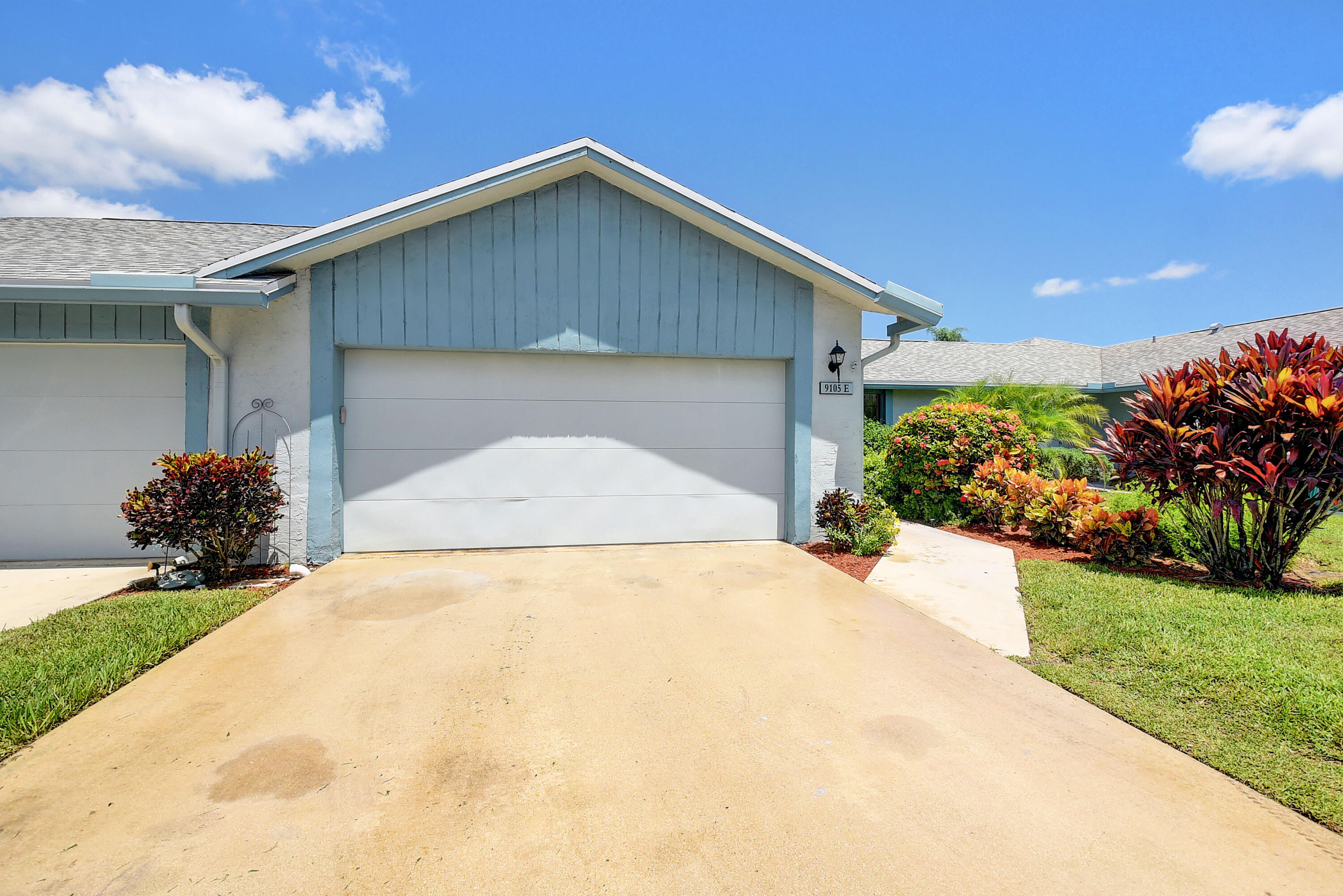 9105 Southwest 22nd Street, Unit E Boca Raton, FL 33428 - Photo 2 of 30 DRIVEWAY
