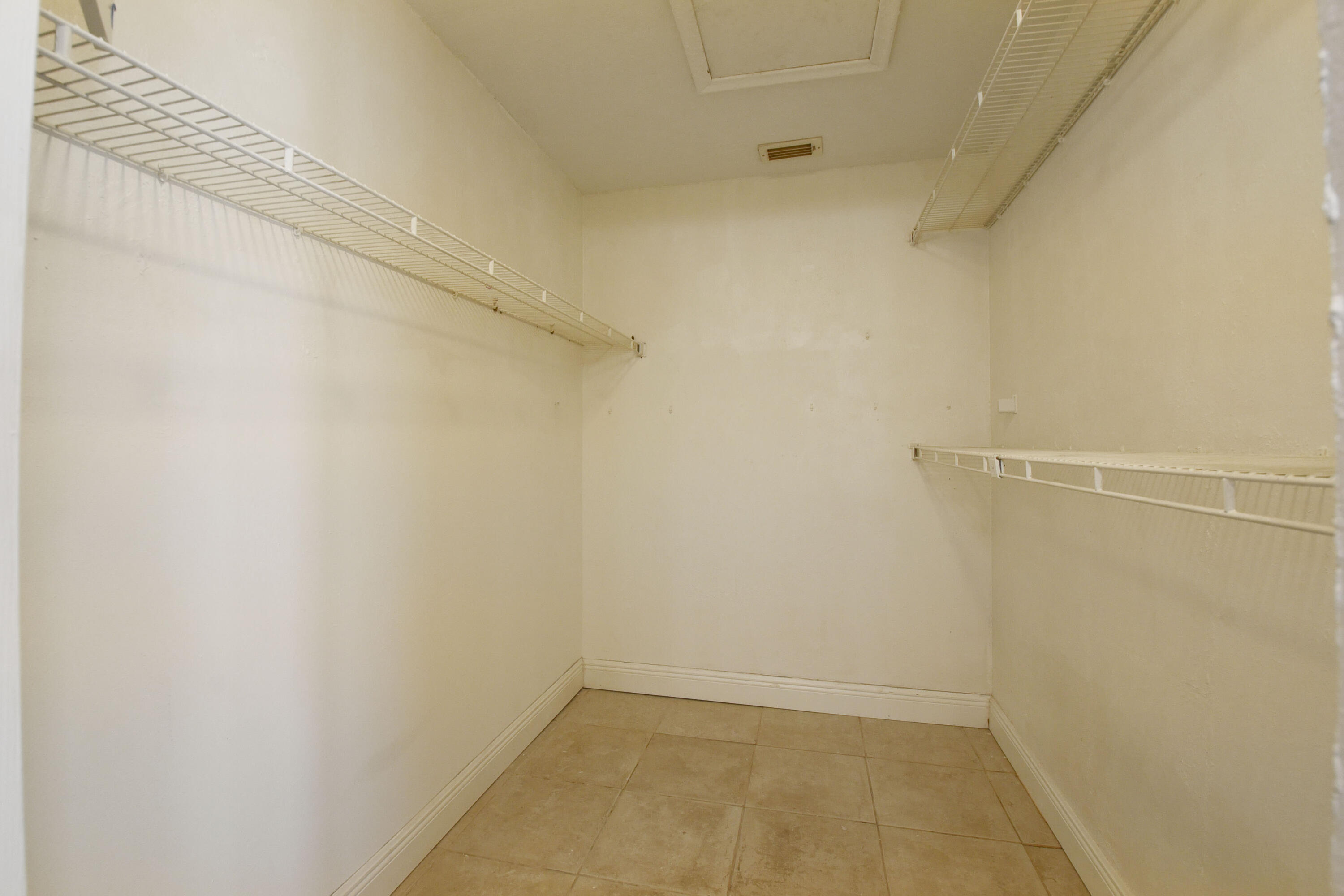9105 Southwest 22nd Street, Unit E Boca Raton, FL 33428 - Photo 22 of 30 MASTERS WALK IN CLOSET