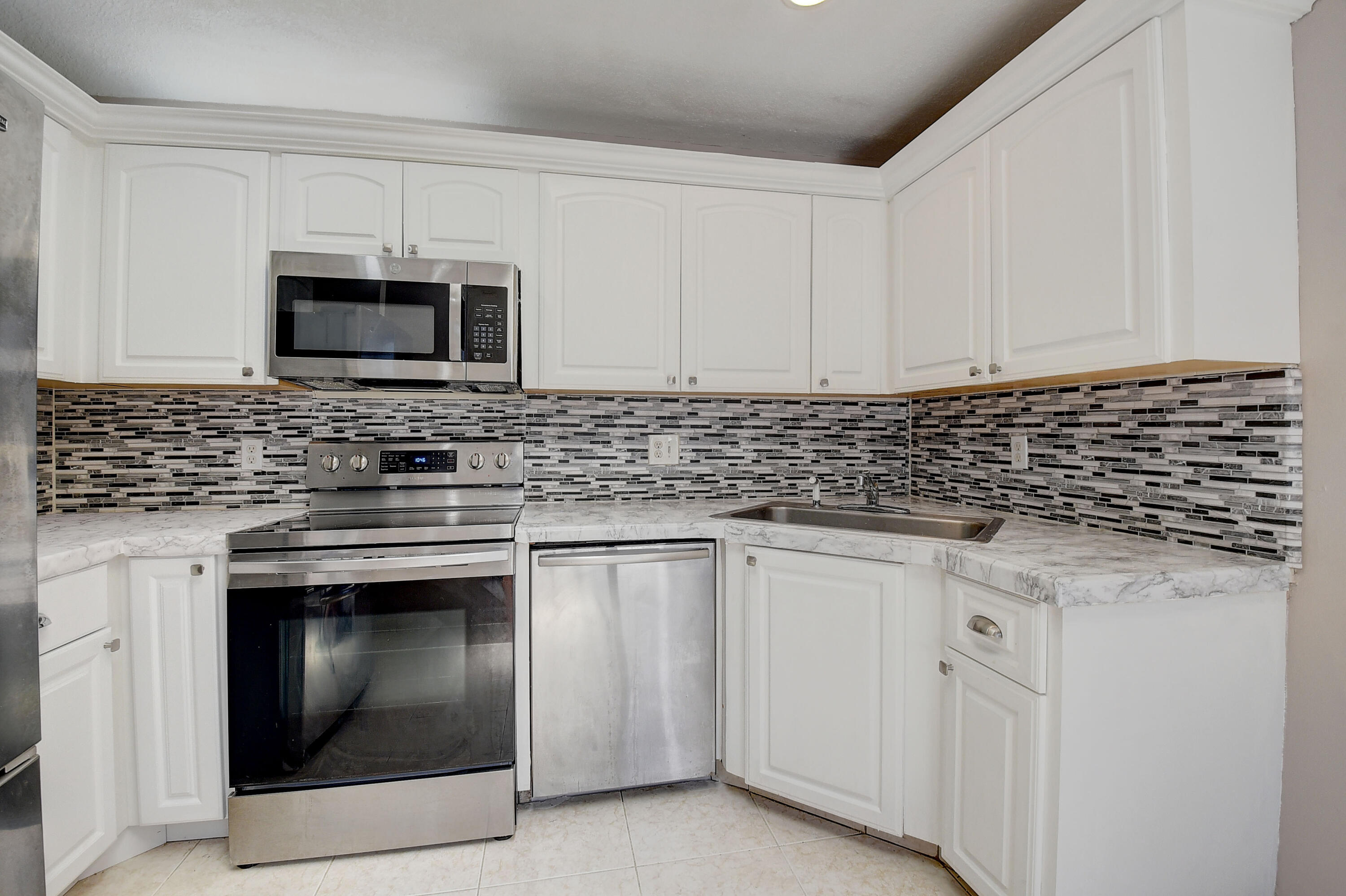 9105 Southwest 22nd Street, Unit E Boca Raton, FL 33428 - Photo 25 of 30 KITCHEN 2