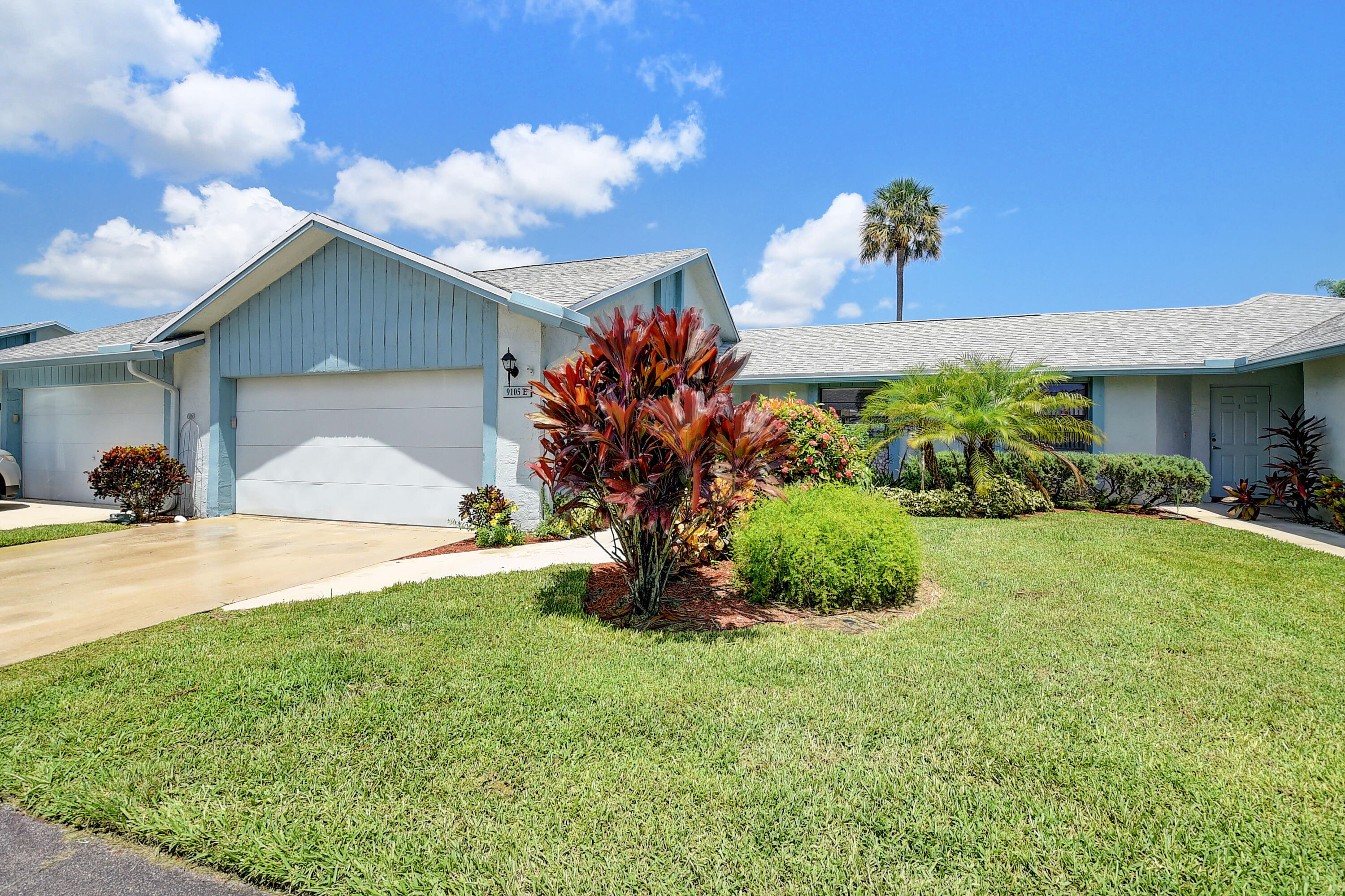 9105 Southwest 22nd Street, Unit E Boca Raton, FL 33428 - Photo 3 of 30 LANDSCAPED YARD