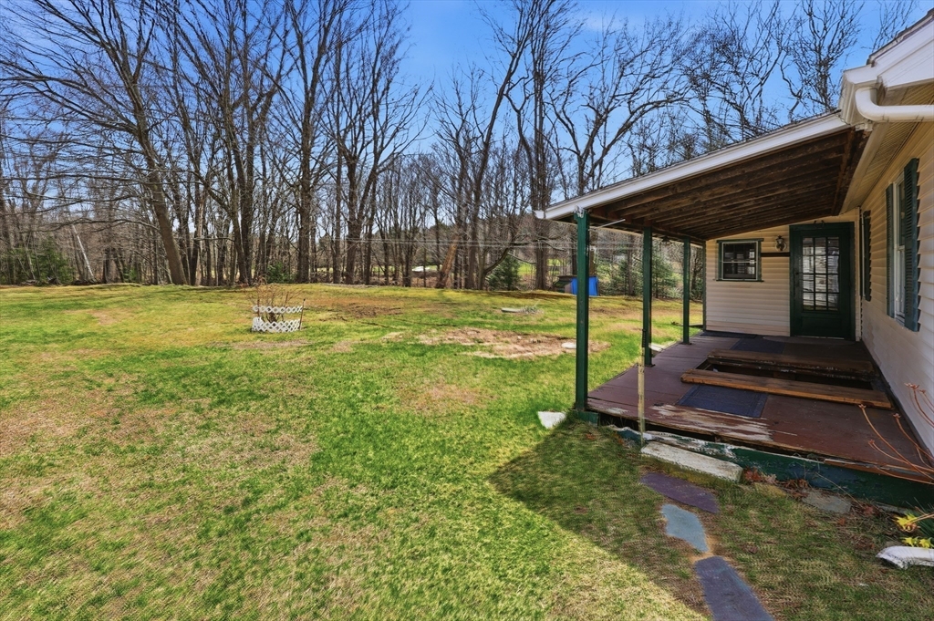 240 Upper Road Deerfield, MA 01342 - Photo 36 of 42 a view of a backyard with large trees