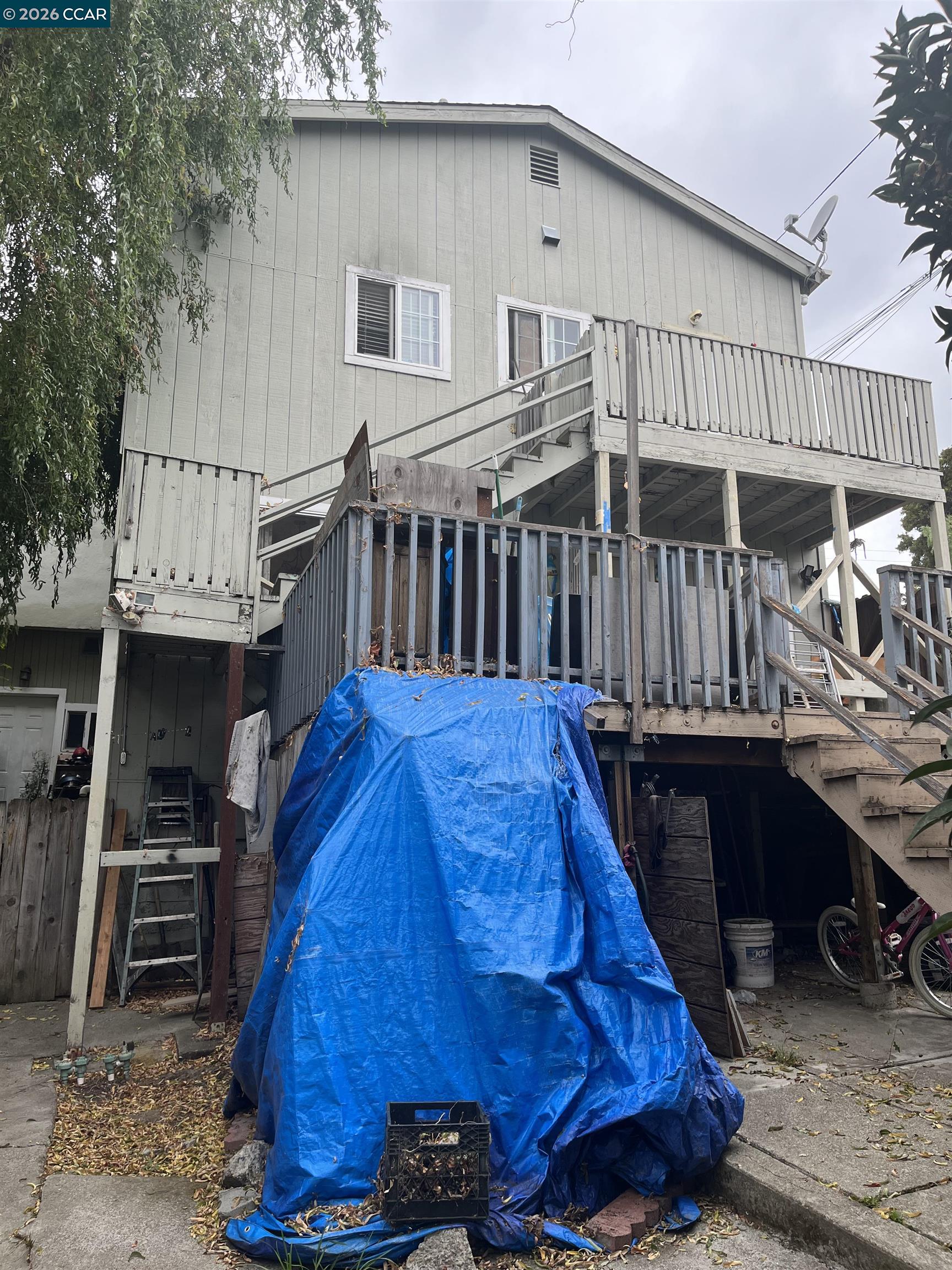 201 Lake Avenue Rodeo, CA 94572 - Photo 4 of 6 a view of roof deck with wooden floor and fence