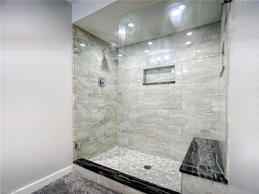 15711 Anderson Lane Fort Myers, FL 33912 - Photo 14 of 48 Downstairs bathroom featuring a designer stall shower