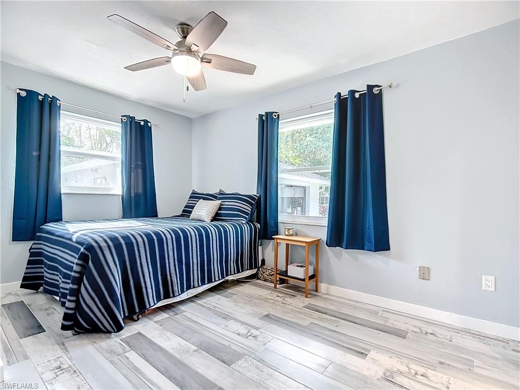 15711 Anderson Lane Fort Myers, FL 33912 - Photo 16 of 48 4th bedroom featuring multiple windows, and a designer ceiling fan,