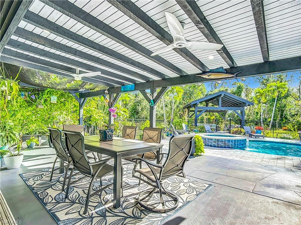 15711 Anderson Lane Fort Myers, FL 33912 - Photo 31 of 48 Covered patio overlooking pool/hot tub and pavillon