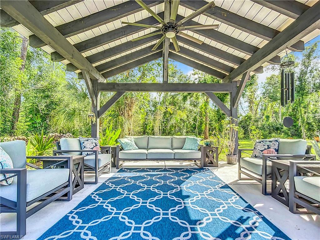 15711 Anderson Lane Fort Myers, FL 33912 - Photo 32 of 48 Pavillion/patio area with eectric and a designer fan for quiet time outside living