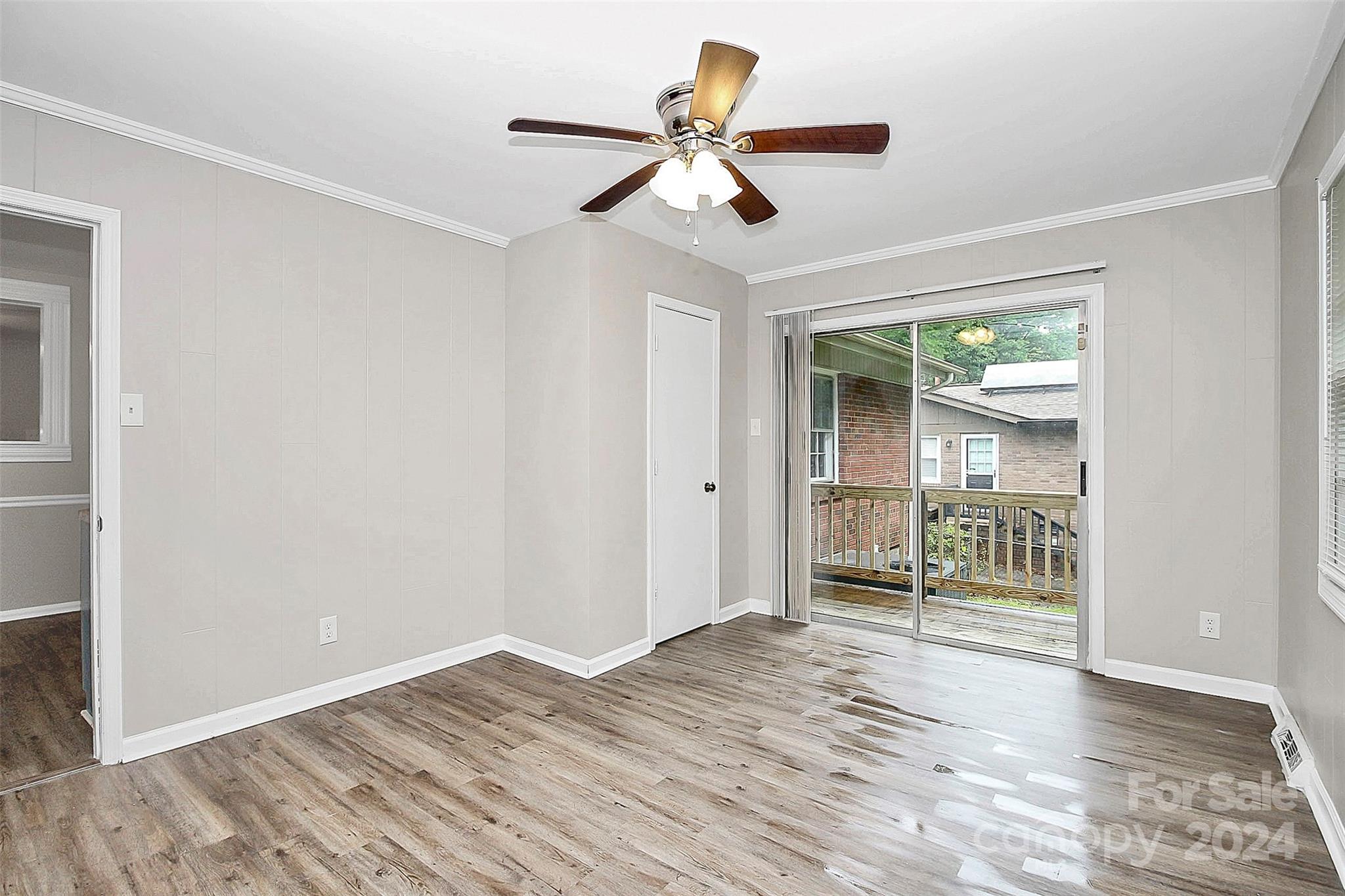 1120 Claremont Road Charlotte, NC 28214 - Photo 14 of 37 a view of empty room with wooden floor