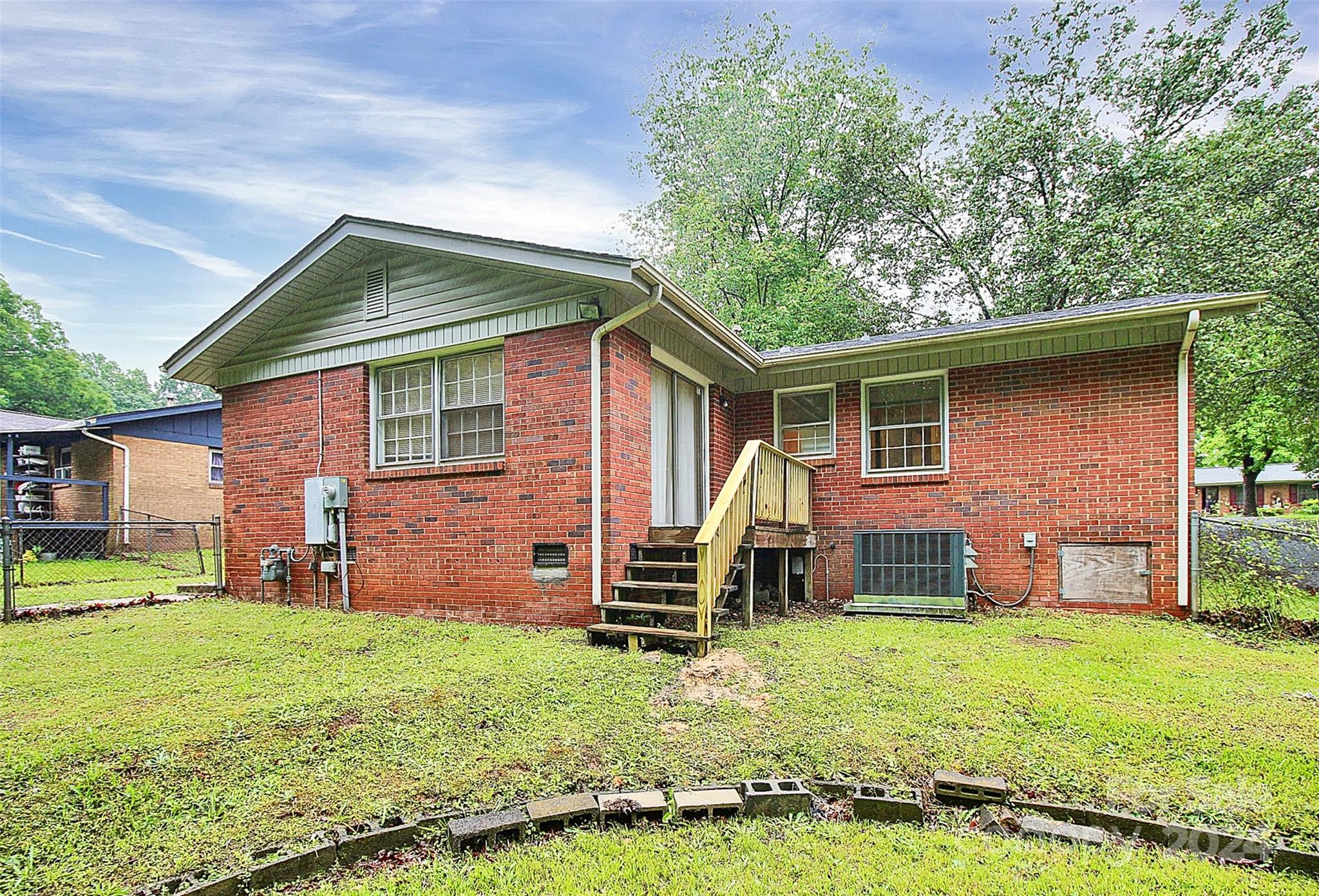 1120 Claremont Road Charlotte, NC 28214 - Photo 33 of 37 a front view of house with a garden